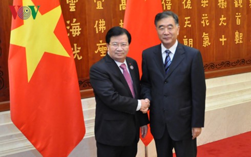 Phó Thủ tướng Trịnh Đình Dũng hội kiến Phó Thủ tướng Quốc vụ viện nước CHND Trung Hoa Uông Dương - ảnh 1